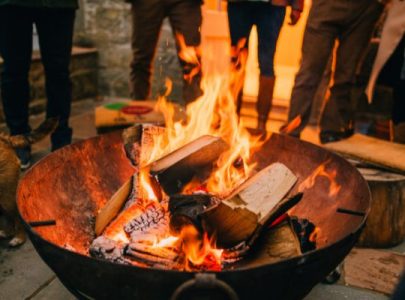 can you burn treated wood in a fire pit